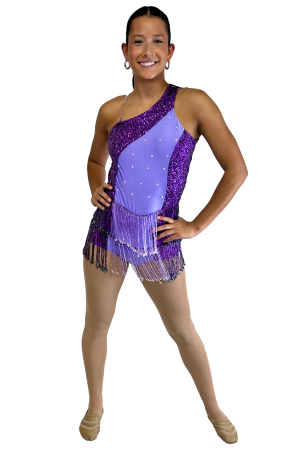 stunning two-tone purple, one-shoulder leotard features a beaded fringe skirt